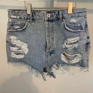 Vintage inspired destroyed denim shorts
